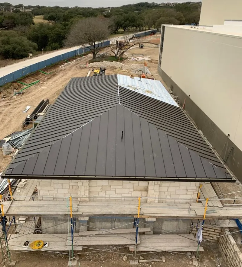 Metal roof new construction with scaffolding in Skiatook